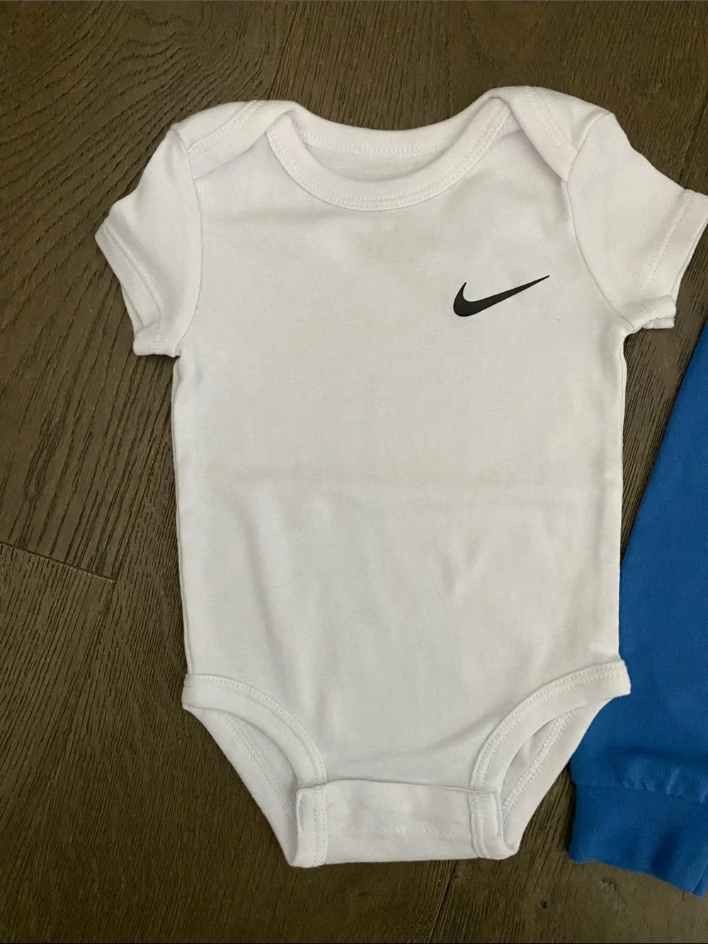 Nike White Bodysuit with Blue Joggers Baby Set